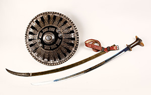 Shield and Sabre sword. A gift by the Emperor Menelik II to Mirko Seljan. The translation of the inscription in the Amharic language: Ethiopia Stretches out her Hands to God.